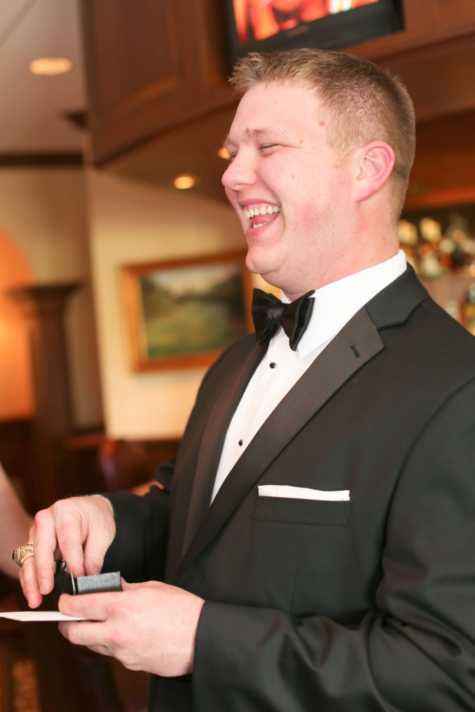 Opening his awesome cufflinks